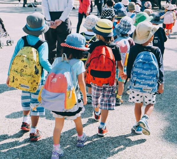 Schoolchildren in Osaka (Photo by note thanun on Unsplash)