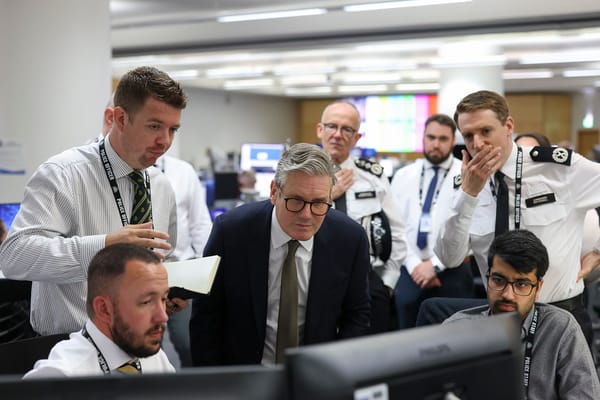 Prime Minister Keir Starmer at Lambeth Police Station. It is unlikely that officers have a role in writing words - but they're certainly hard at work policing them